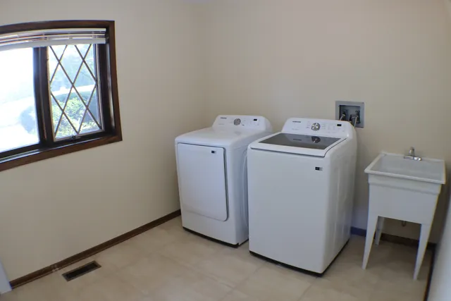 a utility room with dryer and washer