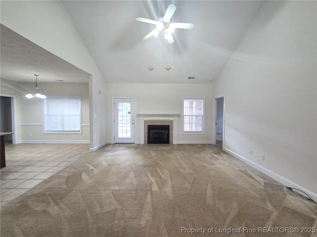 3941 Birkhoff Lane Fayetteville, NC 28304 - Photo 16 of 41 a view of an empty room with a fireplace and a window