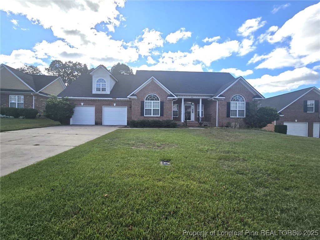 3941 Birkhoff Lane Fayetteville, NC 28304 - Photo 2 of 41 front view of a house with a yard