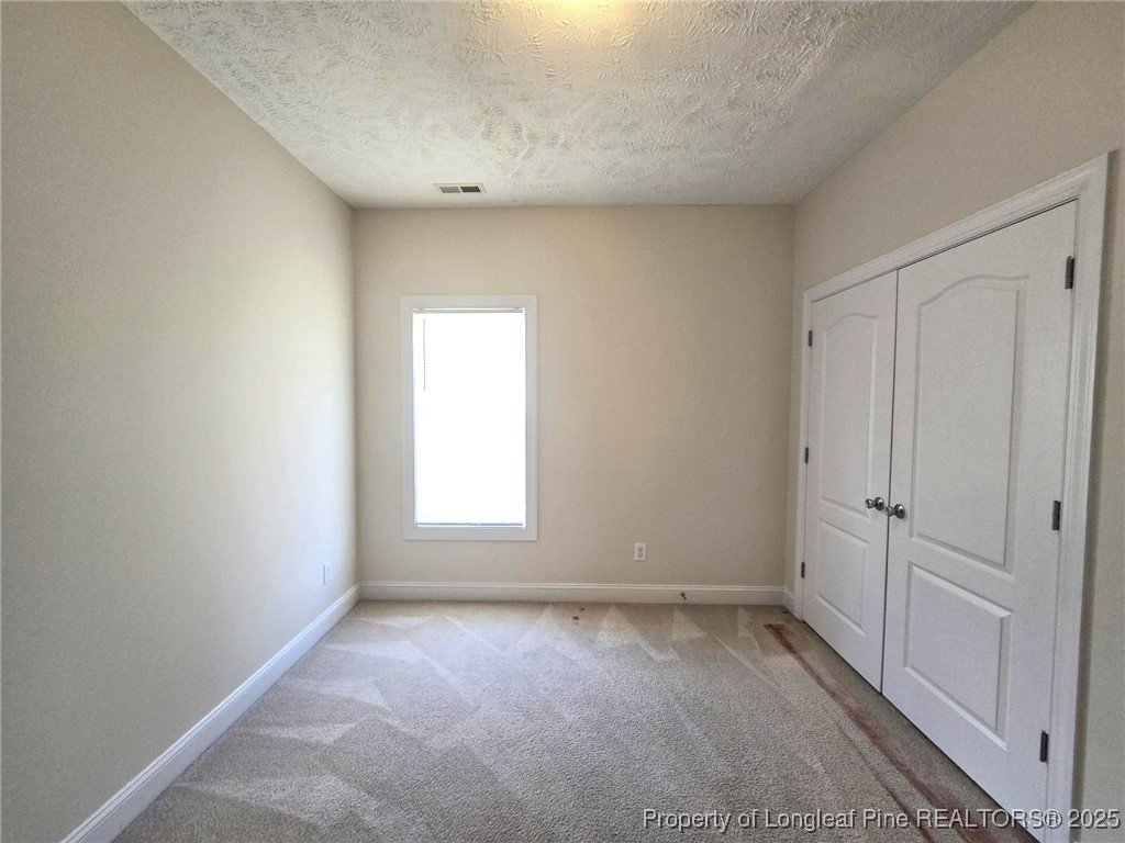 3941 Birkhoff Lane Fayetteville, NC 28304 - Photo 23 of 41 a view of a room that has a window in it