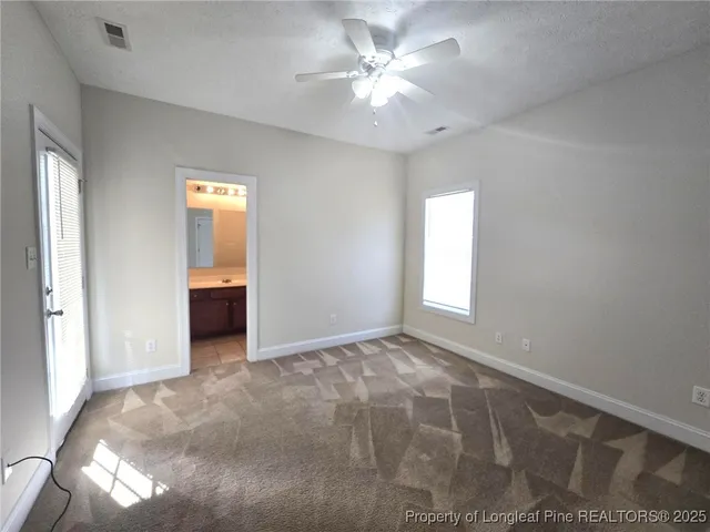 wooden floor in an empty room and a window