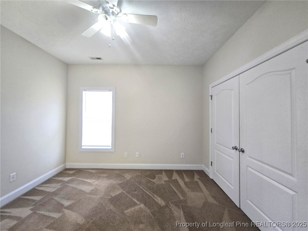 3941 Birkhoff Lane Fayetteville, NC 28304 - Photo 25 of 41 wooden floor in an empty room and a window