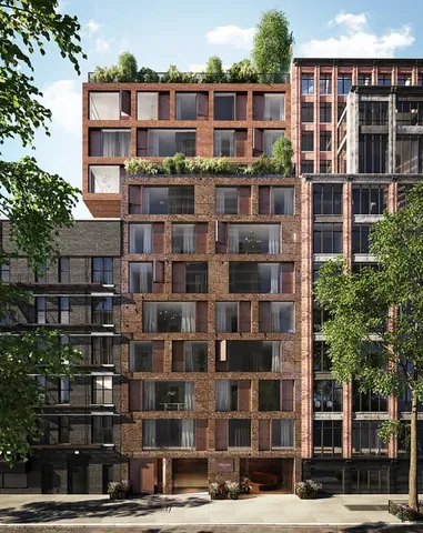 a couch and outdoor view with sitting space