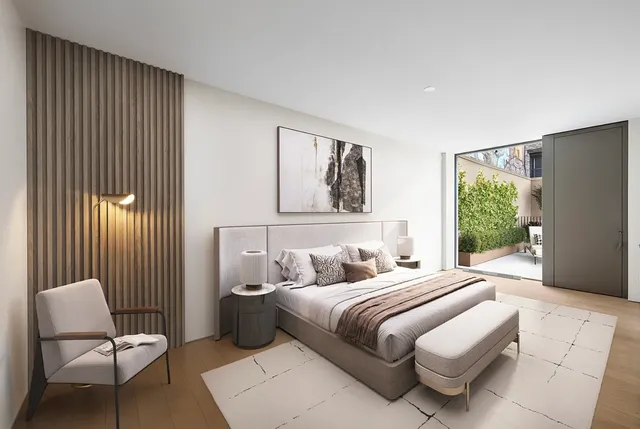 a living room with furniture a dining table and a fireplace