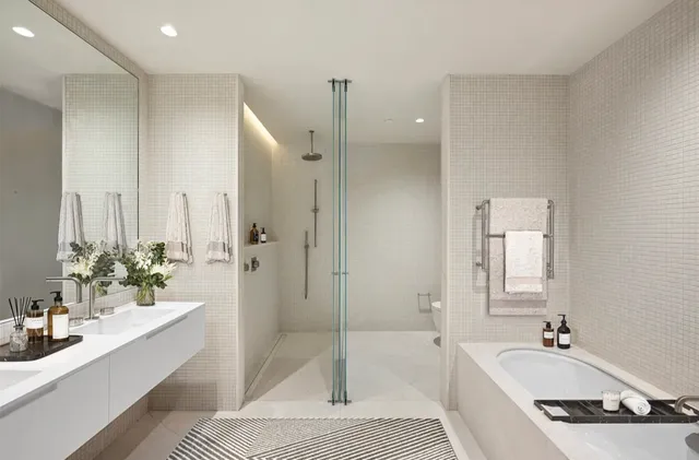 a bedroom with a bed and a chair