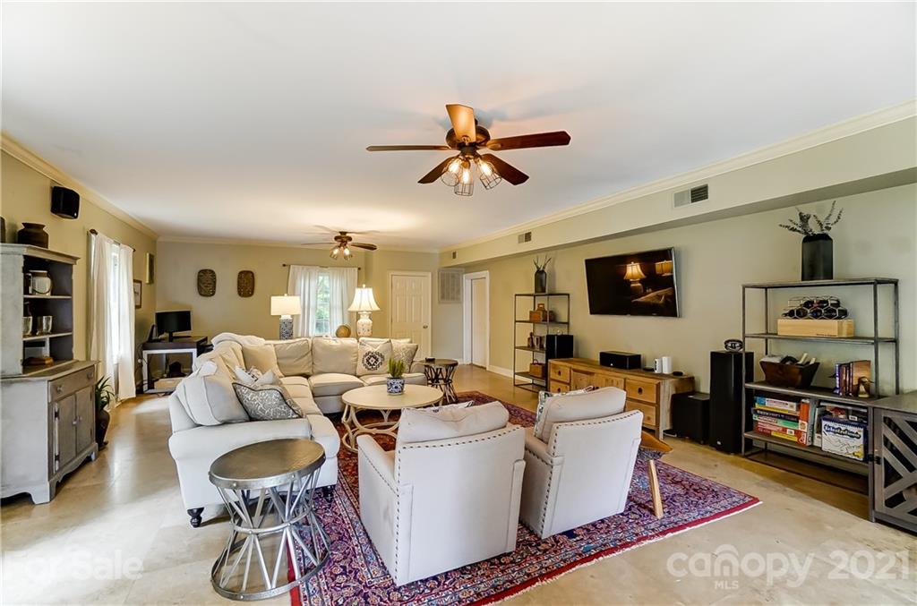 2610 Providence Road Charlotte, NC 28211 - Photo 13 of 37 a living room with furniture and a flat screen tv