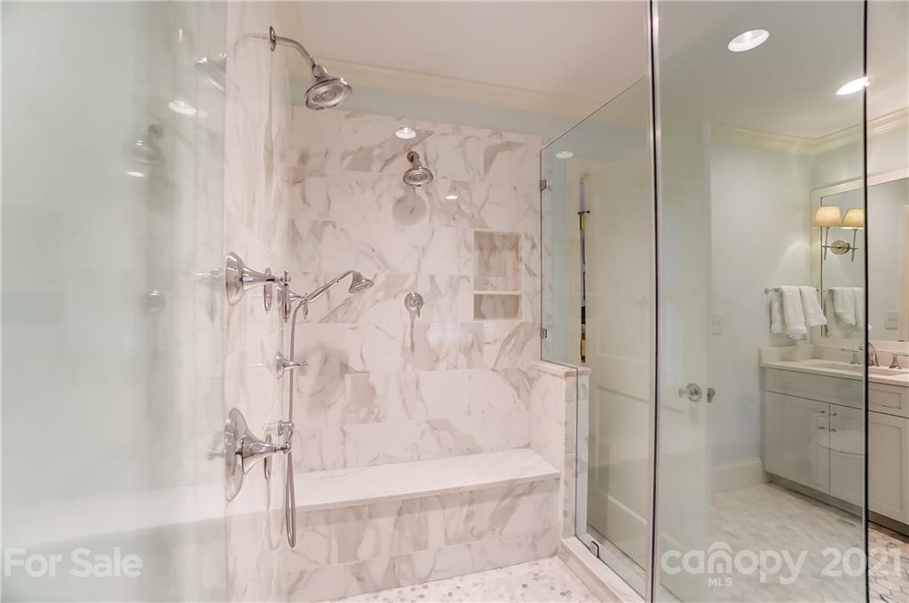 2610 Providence Road Charlotte, NC 28211 - Photo 18 of 37 a bathroom with a shower and a glass door
