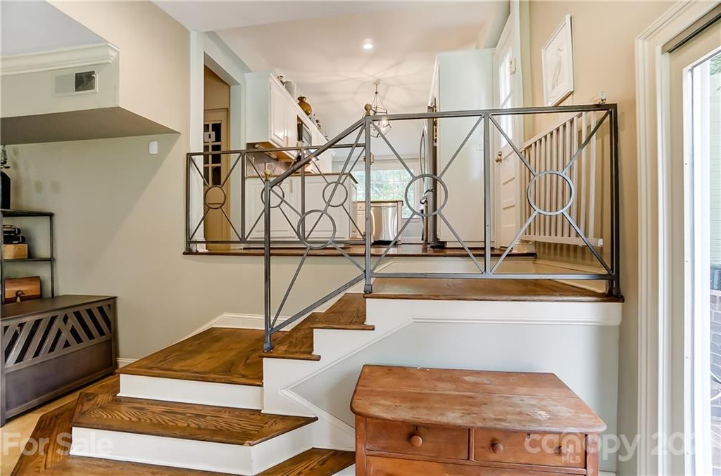 2610 Providence Road Charlotte, NC 28211 - Photo 3 of 37 a view of entryway and hall with wooden floor