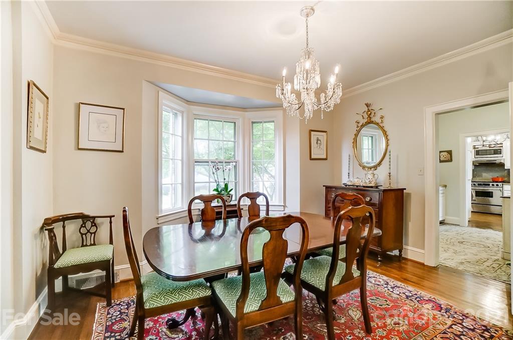2610 Providence Road Charlotte, NC 28211 - Photo 9 of 37 a view of a a dining room with furniture window and wooden floor