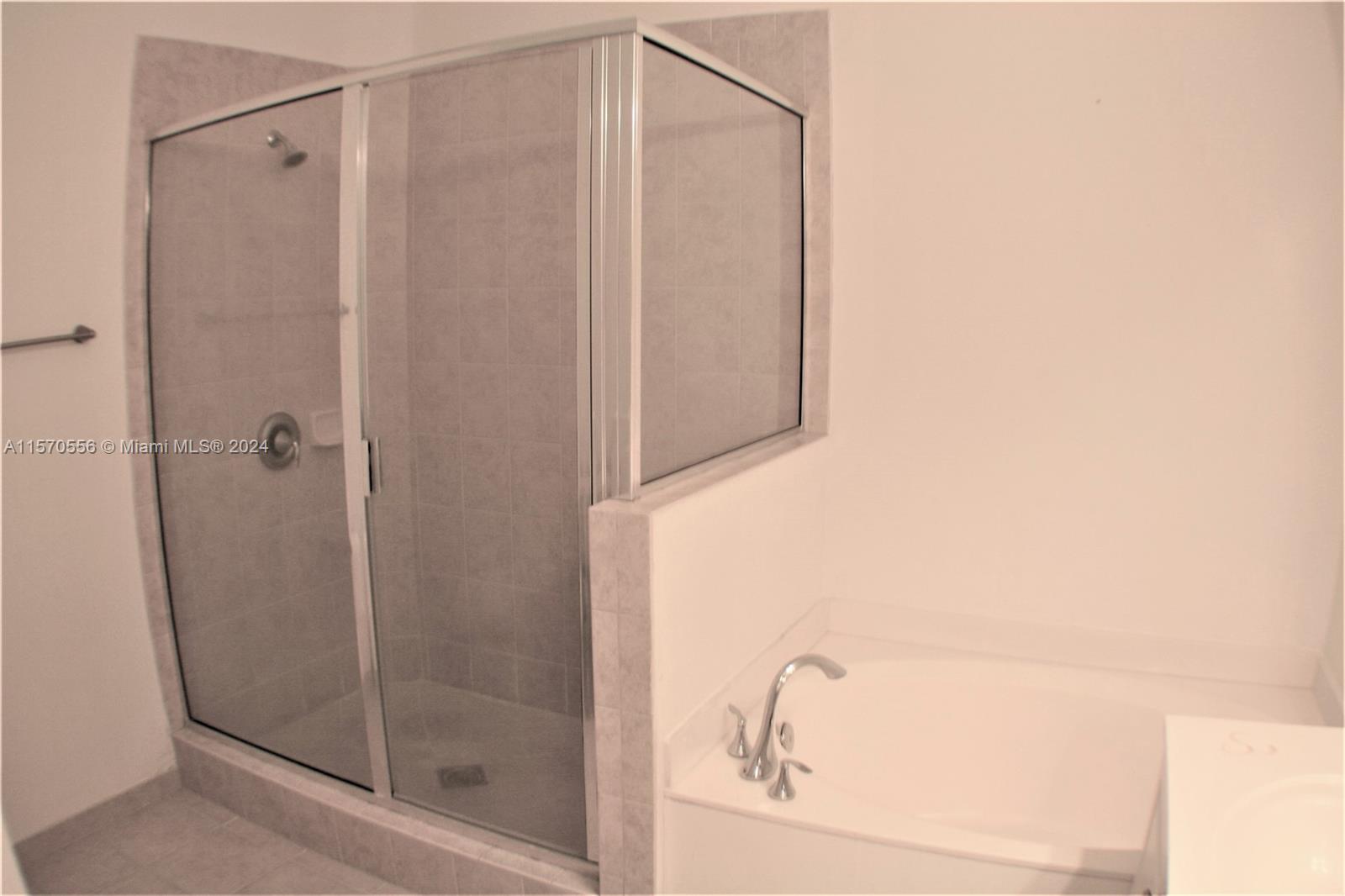 202 Las Brisas Circle Sunrise, FL 33326 - Photo 9 of 12 a bathroom with a shower