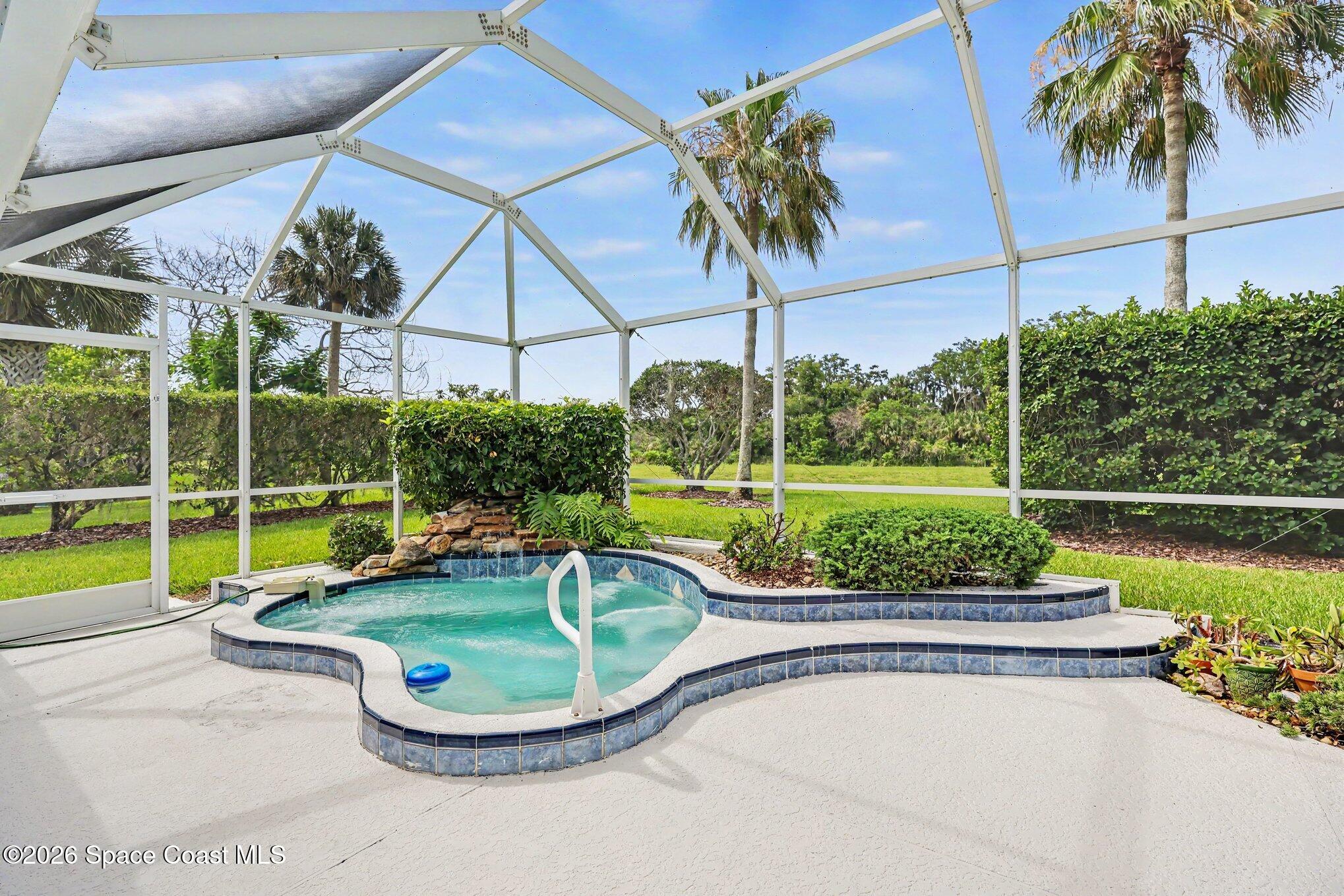 1230 Meadowbrook Road Northeast Palm Bay, FL 32905 - Photo 3 of 43 Spa with Waterfall