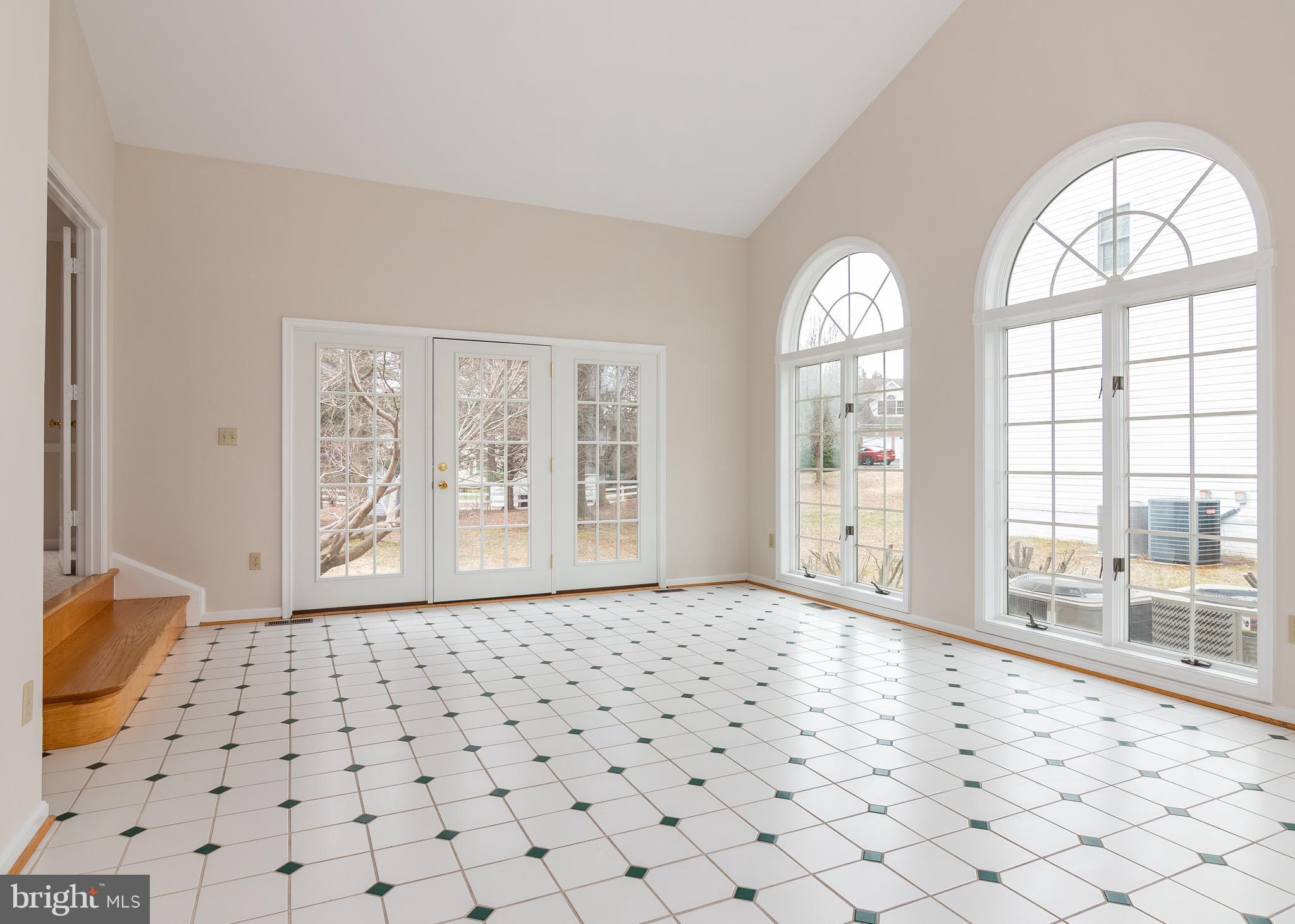 8207 Spring Branch Court Laurel, MD 20723 - Photo 11 of 40 Sun room with 5 palladium windows