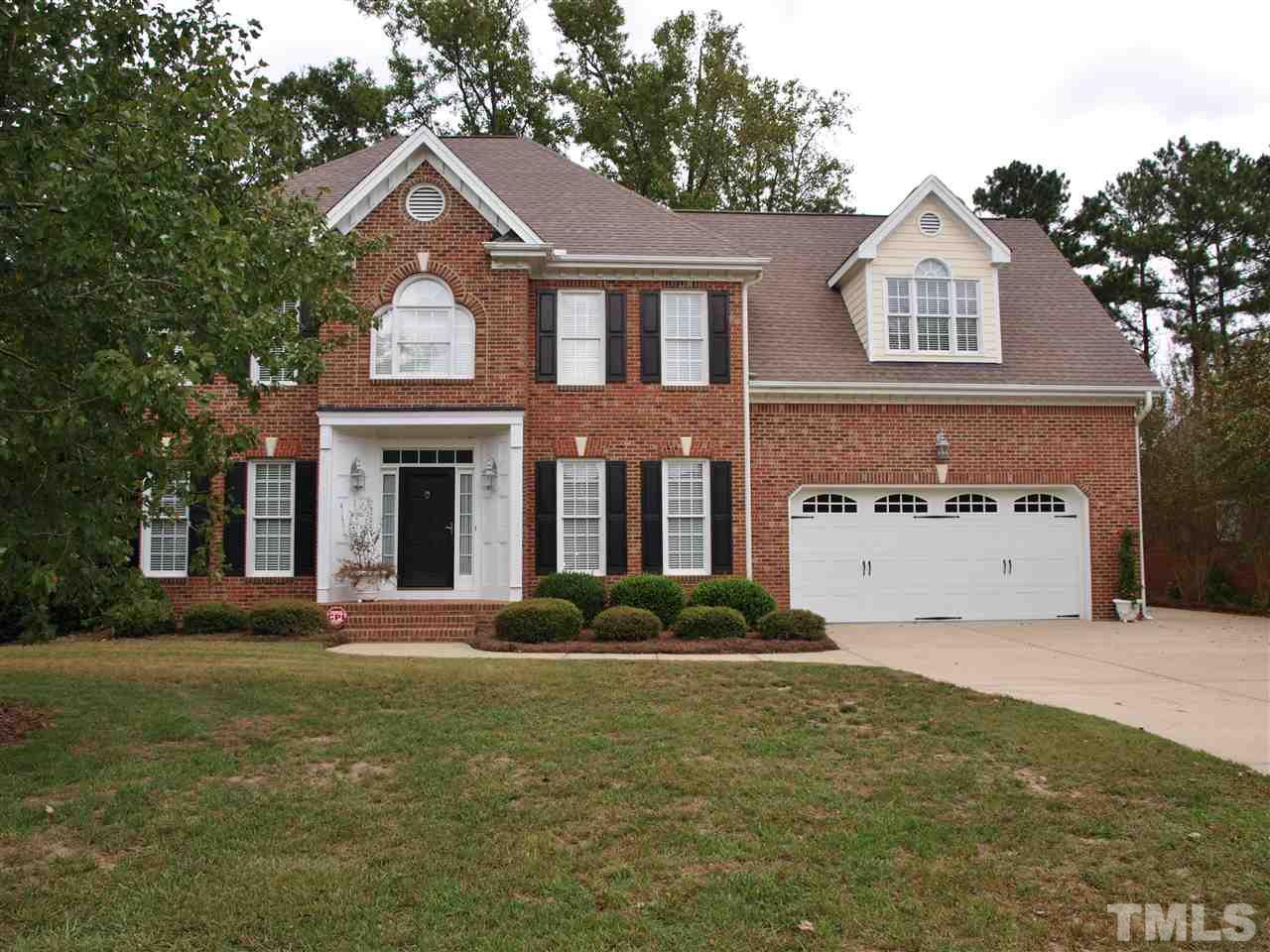 3317 La Costa Way Raleigh, NC 27610 - Photo 2 of 25 a front view of a house with a garden