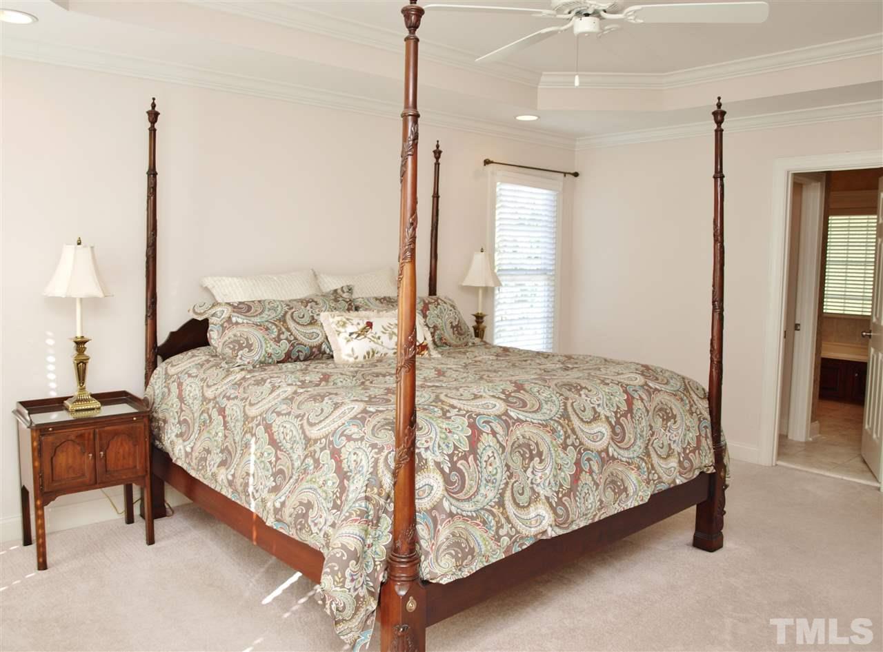 3317 La Costa Way Raleigh, NC 27610 - Photo 13 of 25 a bedroom with a bed and window