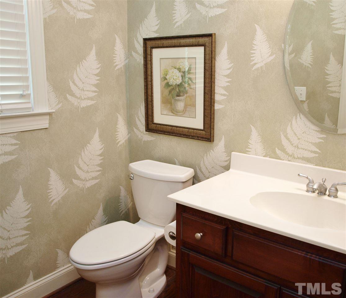 3317 La Costa Way Raleigh, NC 27610 - Photo 8 of 25 a bathroom with a sink and a toilet