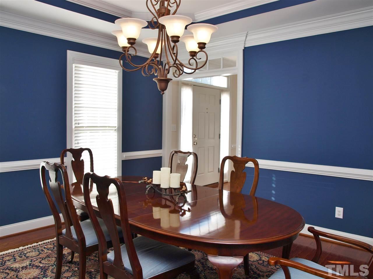 3317 La Costa Way Raleigh, NC 27610 - Photo 10 of 25 a dining room with furniture and chandelier
