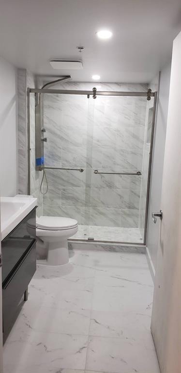 410 South Park Road, Unit 210 Hollywood, FL 33021 - Photo 5 of 5 a bathroom with a shower and a toilet