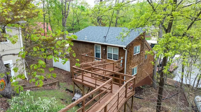 $499,900 | 718 Triple Cove Lane, Climax Springs, MO 65324