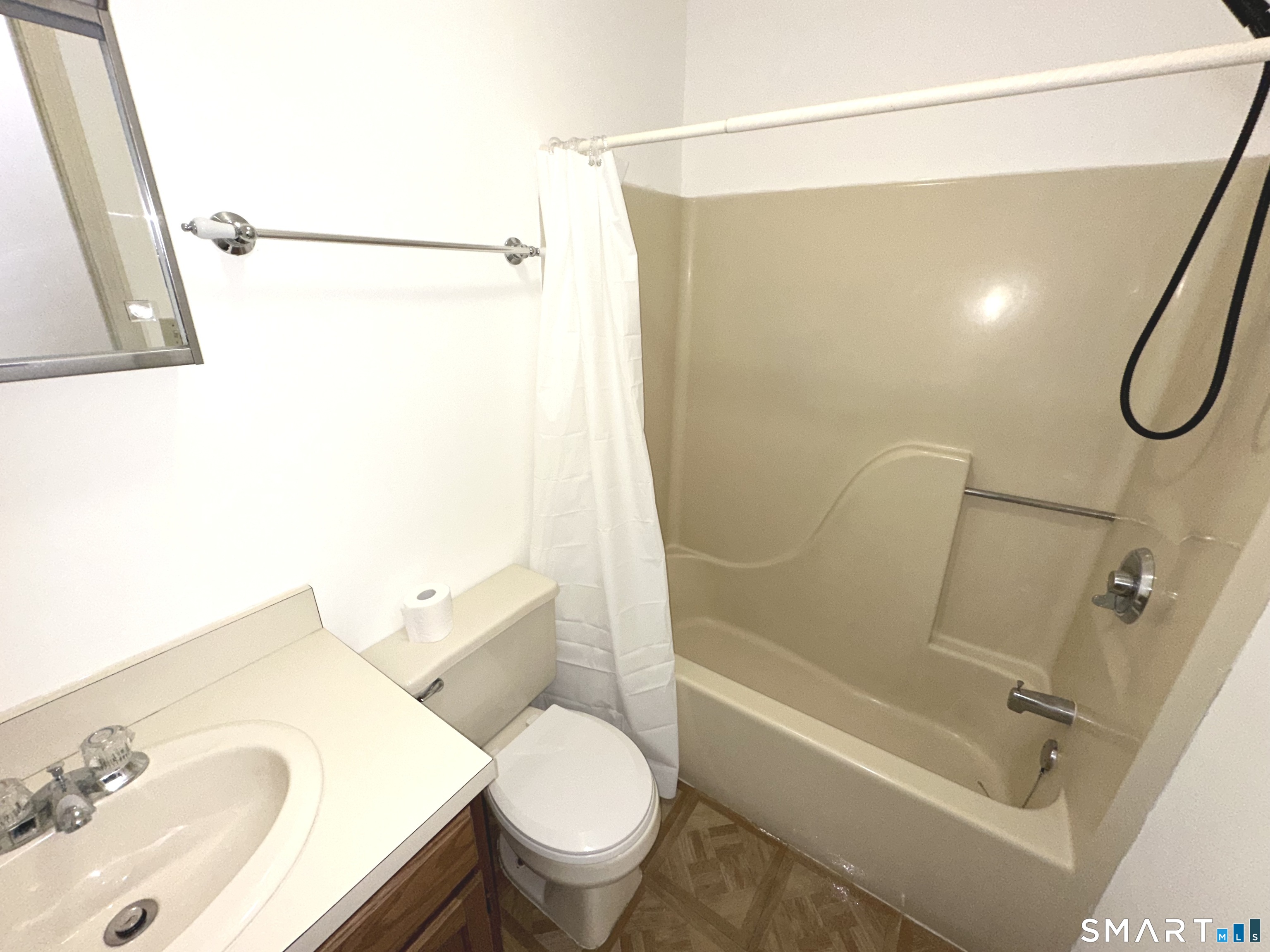 243 Judd Square, Unit 243 Wallingford, CT 06492 - Photo 14 of 17 a bathroom with a sink toilet and shower