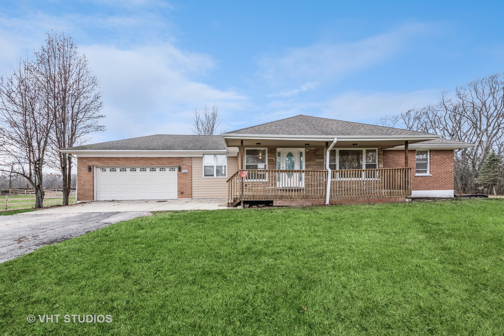 189 Old Sutton Road Barrington Hills, IL 60010 - Photo 1 of 24 a view of a house with a yard and sitting area