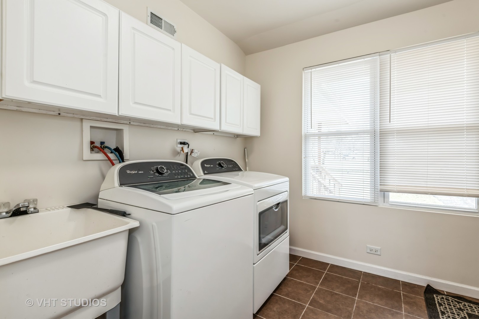 189 Old Sutton Road Barrington Hills, IL 60010 - Photo 17 of 24 a utility room with sink dryer and washer