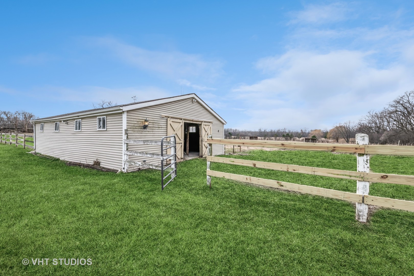 189 Old Sutton Road Barrington Hills, IL 60010 - Photo 20 of 24 a view of a house with a yard