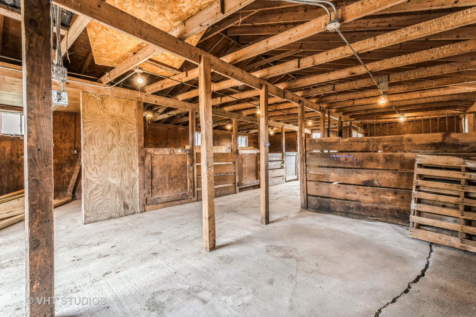 189 Old Sutton Road Barrington Hills, IL 60010 - Photo 22 of 24 a view of an empty room with racks on the wall