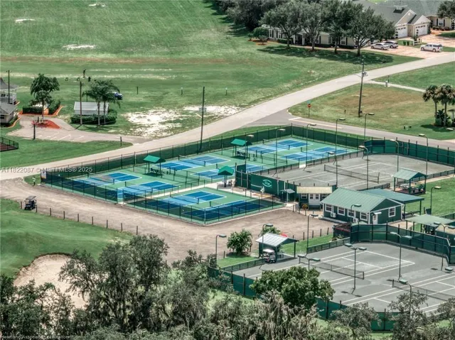 a view of a golf course with a lake
