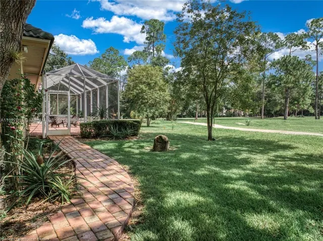 a kitchen with stainless steel appliances granite countertop a lot of counter space and a sink