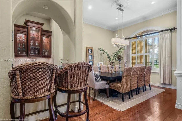 a kitchen with stainless steel appliances granite countertop a stove and a sink