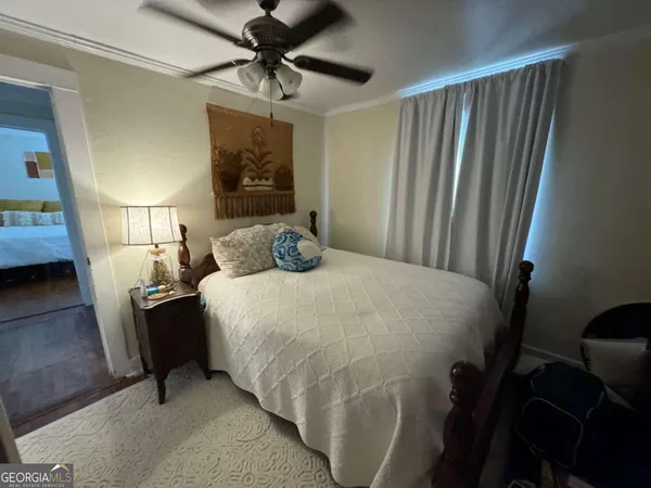 a bathroom with a sink vanity tub and a mirror