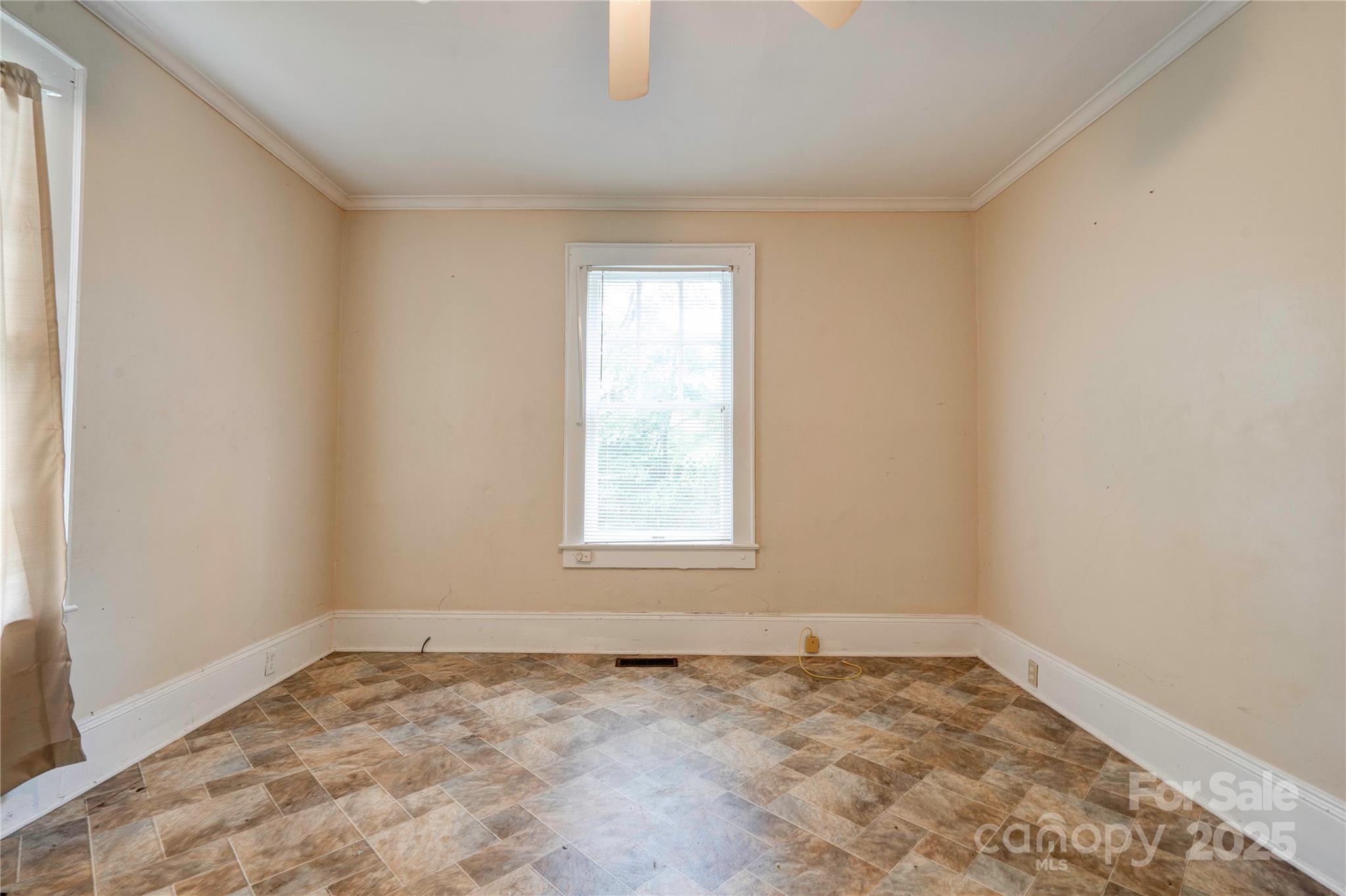 1521 Kings Road Shelby, NC 28150 - Photo 15 of 38 an empty room with a window