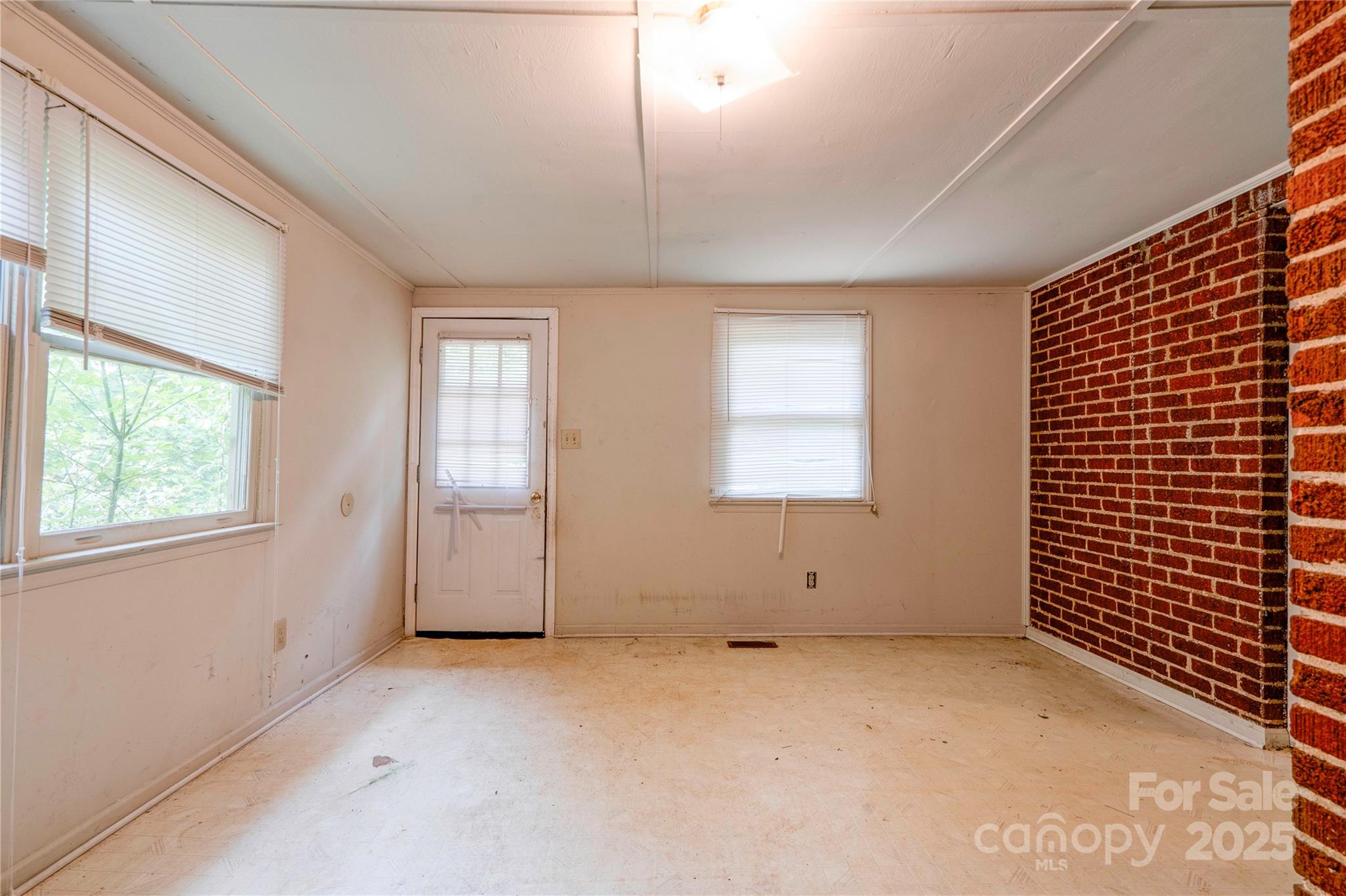 1521 Kings Road Shelby, NC 28150 - Photo 20 of 38 an empty room with windows