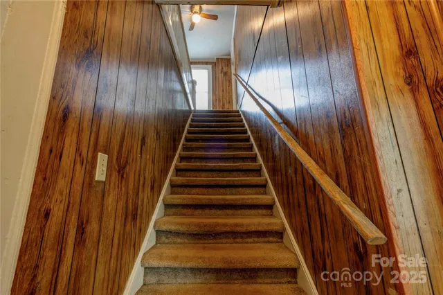 a view of balcony with furniture