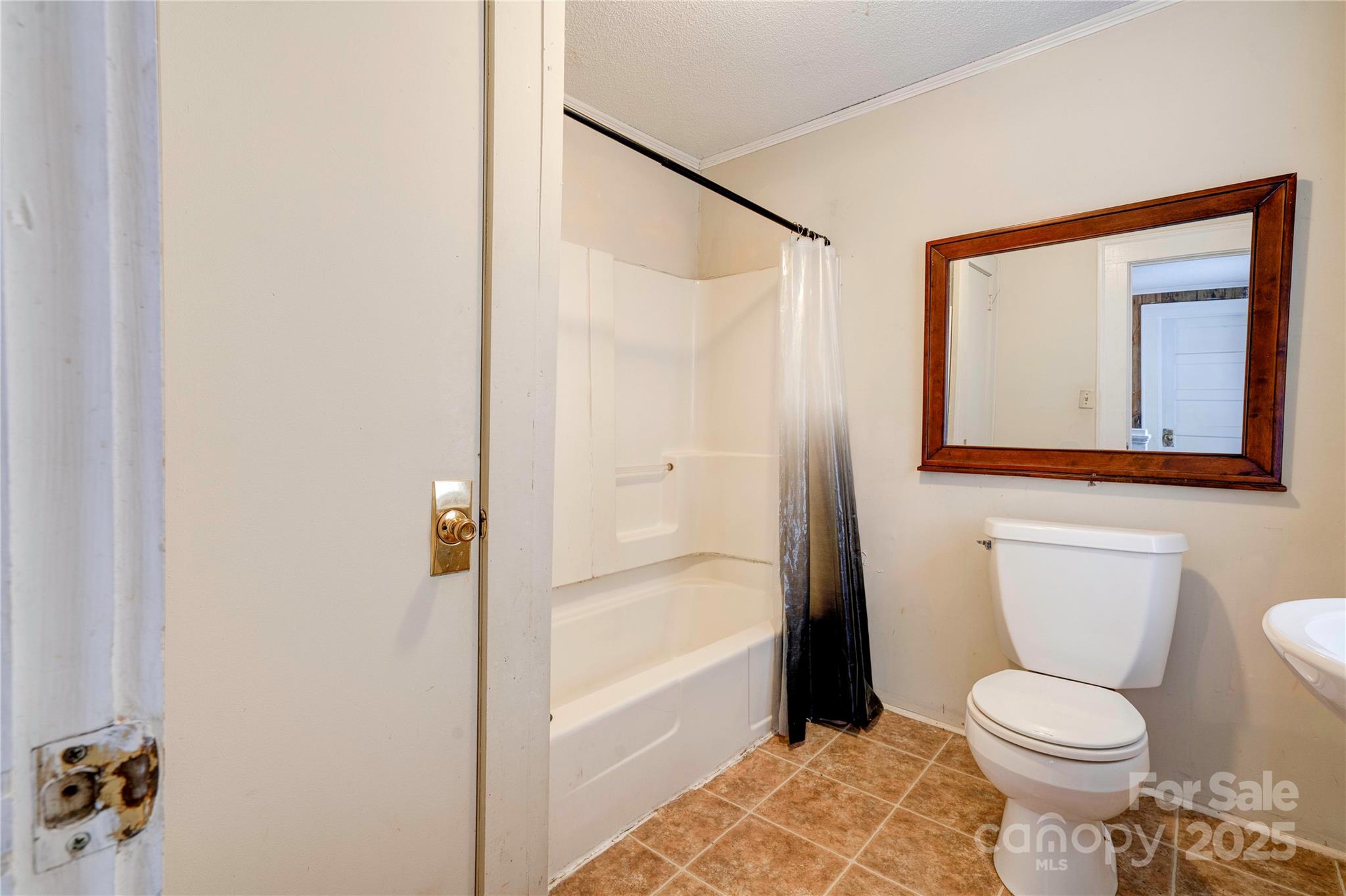 1521 Kings Road Shelby, NC 28150 - Photo 27 of 38 a bathroom with a toilet and a shower