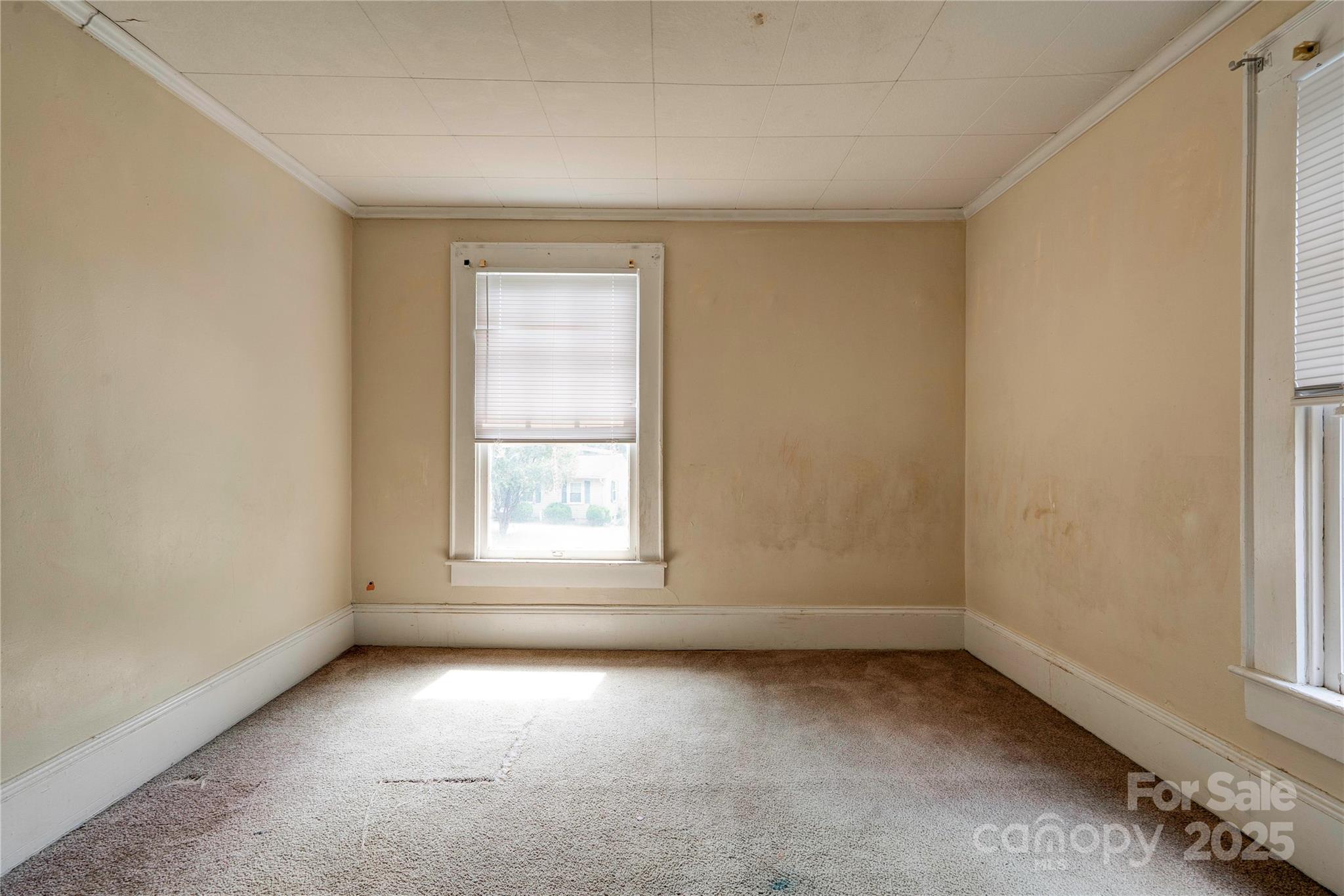 1521 Kings Road Shelby, NC 28150 - Photo 31 of 38 an empty room with a window