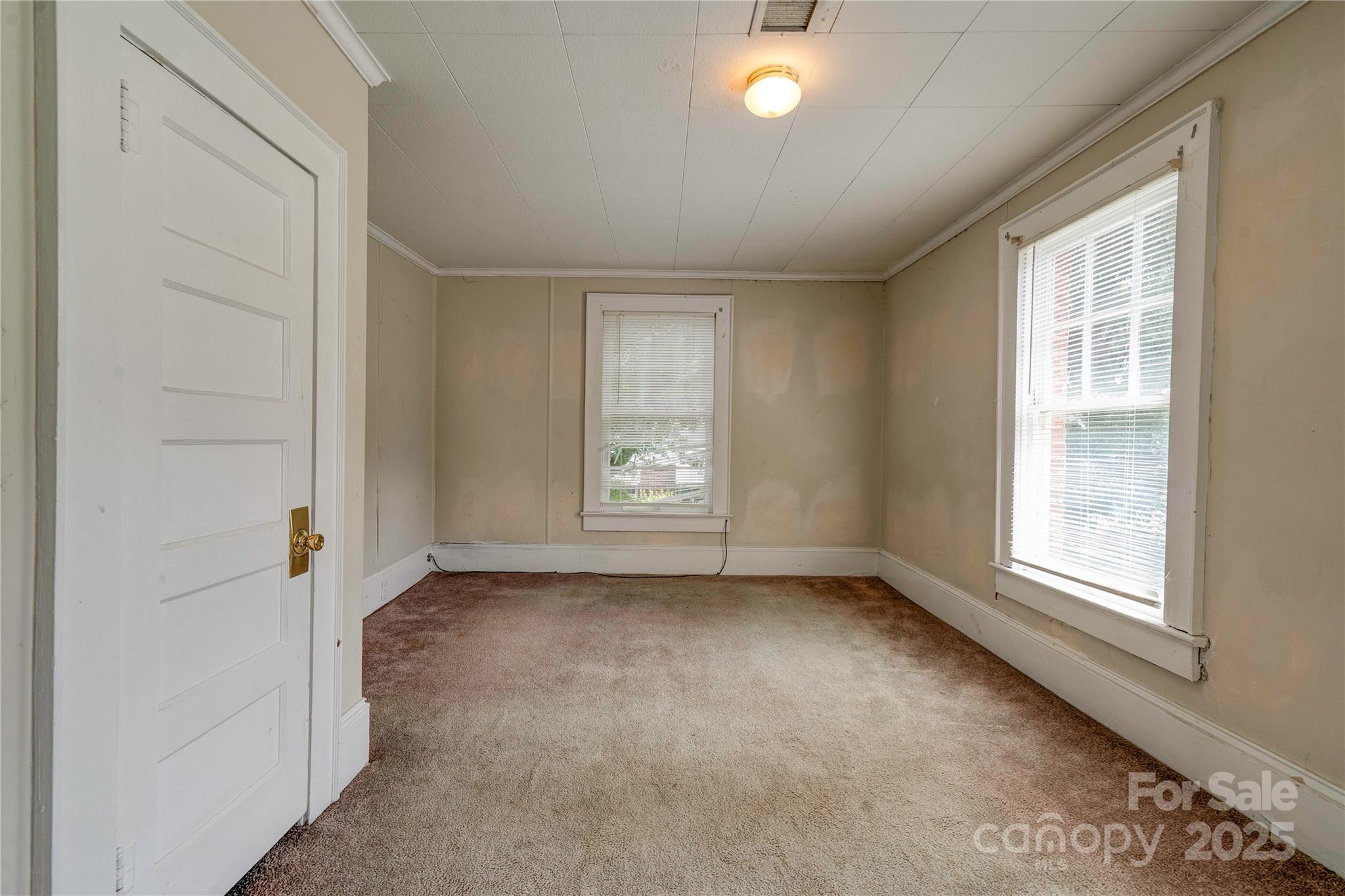 1521 Kings Road Shelby, NC 28150 - Photo 34 of 38 an empty room with windows