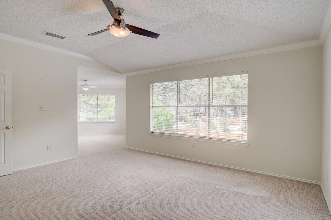 7604 Napier Trail Austin, TX 78729 - Photo 17 of 27 a view of an empty room with a window