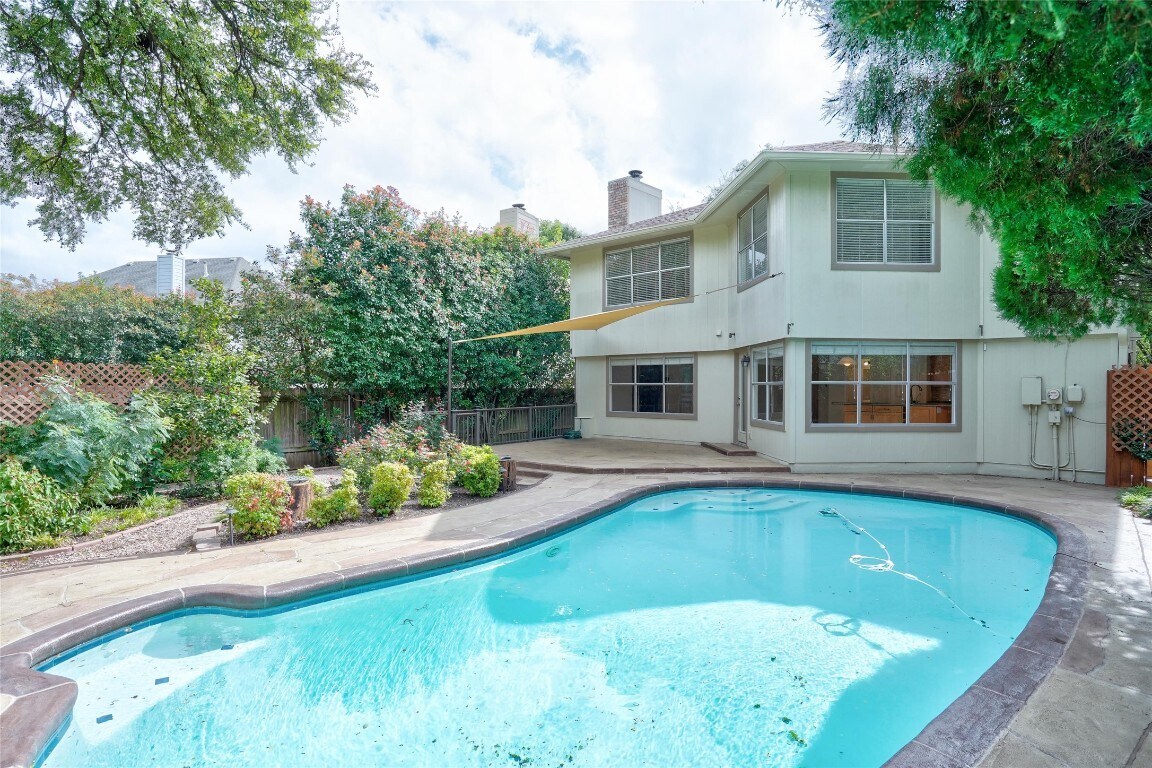 7604 Napier Trail Austin, TX 78729 - Photo 23 of 27 a view of a house with swimming pool and sitting area