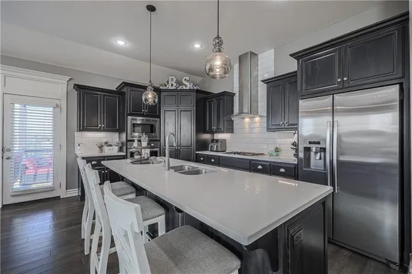 $585,000 | 1214 Cothran Court, Raymore, MO 64083