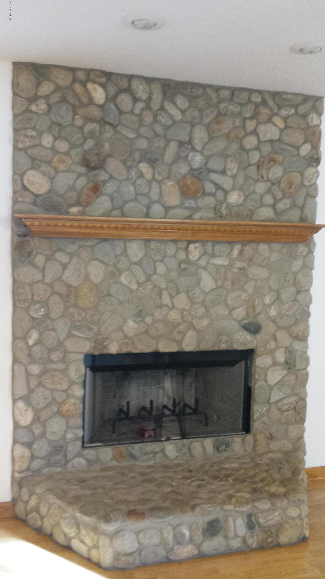 4822 Ricker Road Jacksonville, FL 32210 - Photo 14 of 50 a view of fireplace