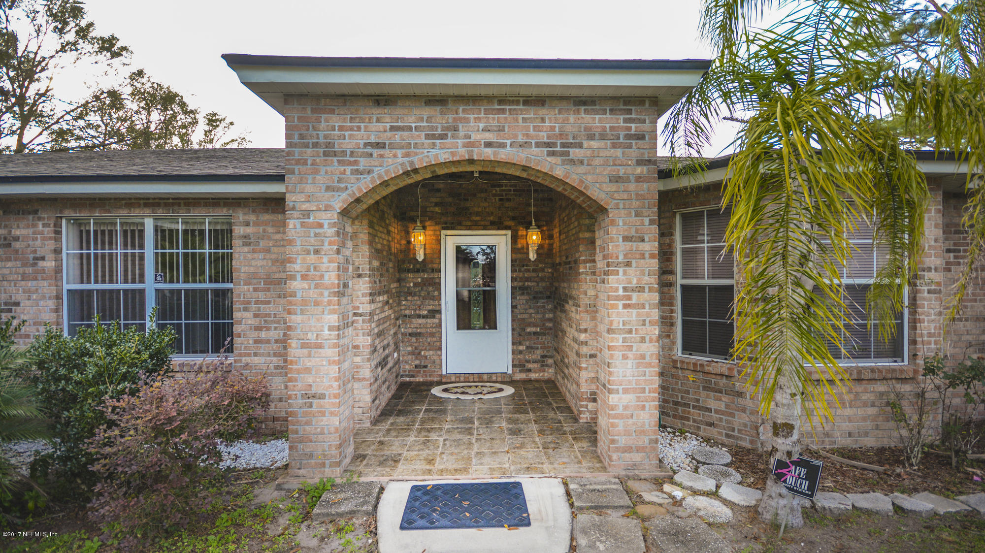 4822 Ricker Road Jacksonville, FL 32210 - Photo 2 of 50 a front view of a house with plants