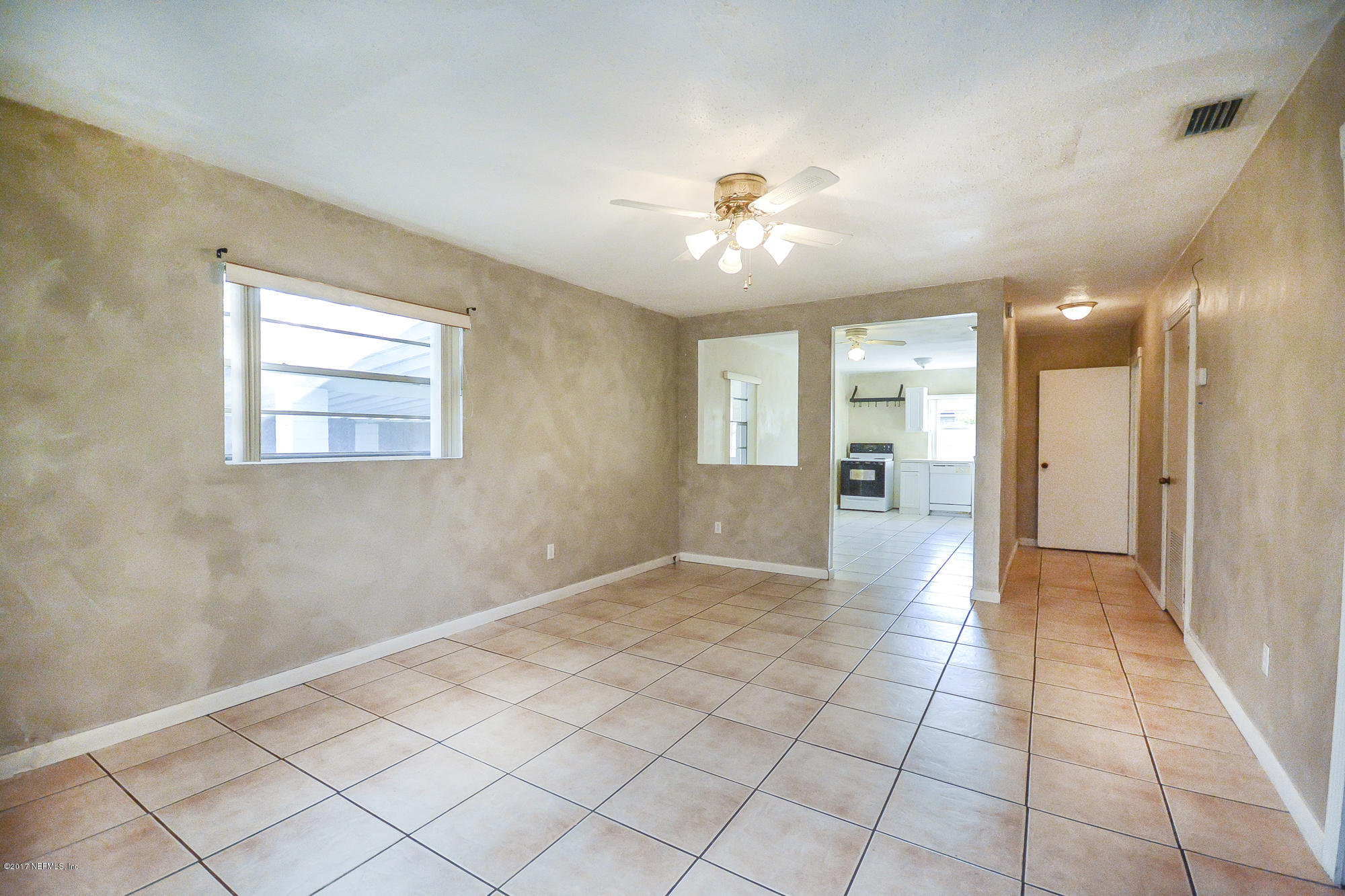 4822 Ricker Road Jacksonville, FL 32210 - Photo 39 of 50 a view of livingroom with workspace
