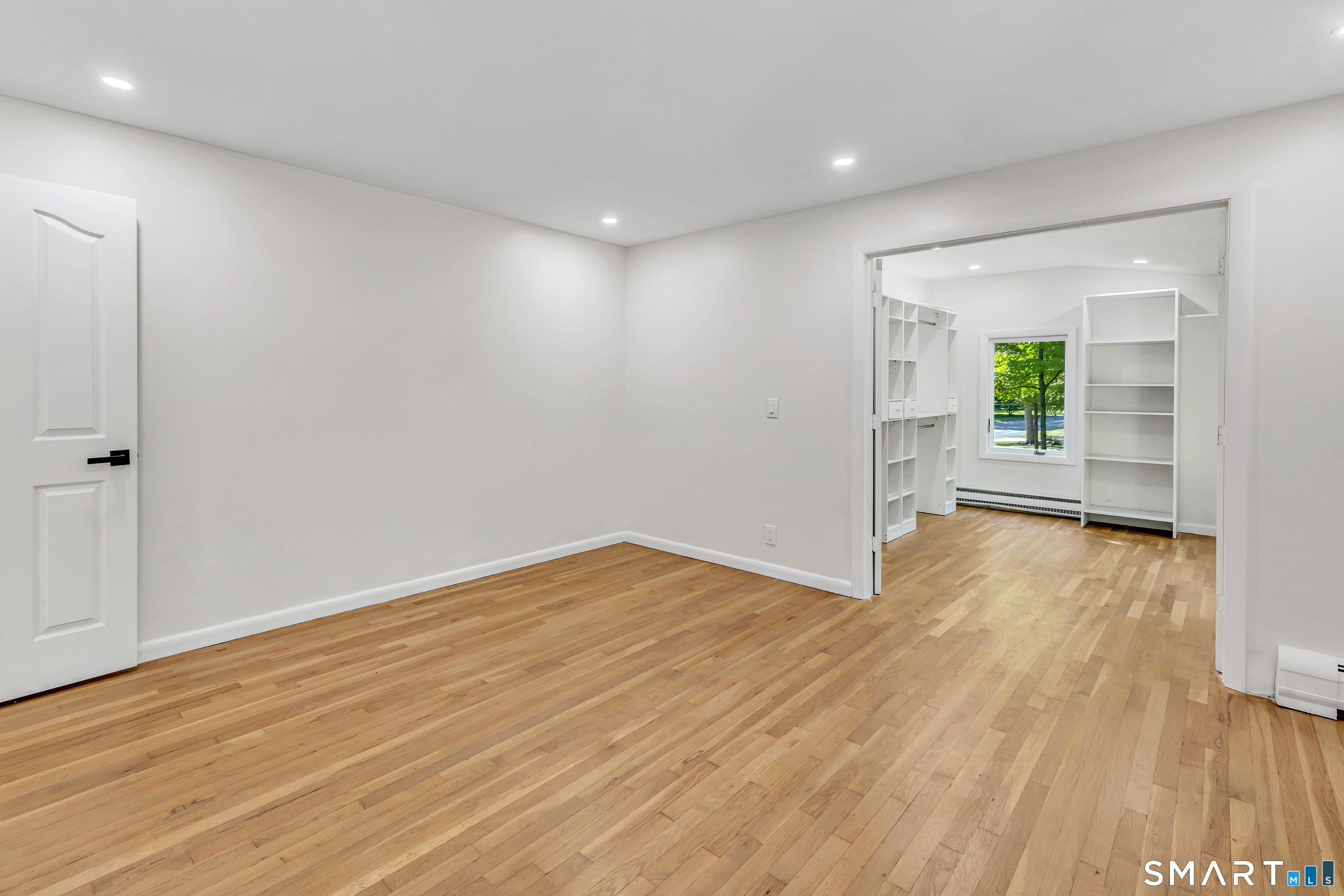 48 Crestwood Road Monroe, CT 06468 - Photo 22 of 32 wooden floor in an empty room with a window