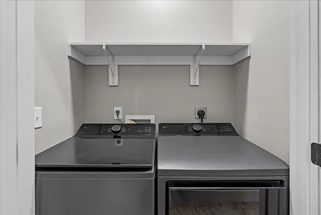 a view of a sink with cabinets