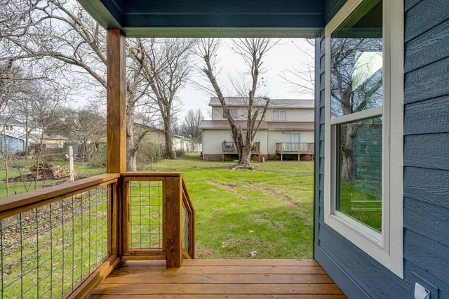 a view of porch with a swimming pool