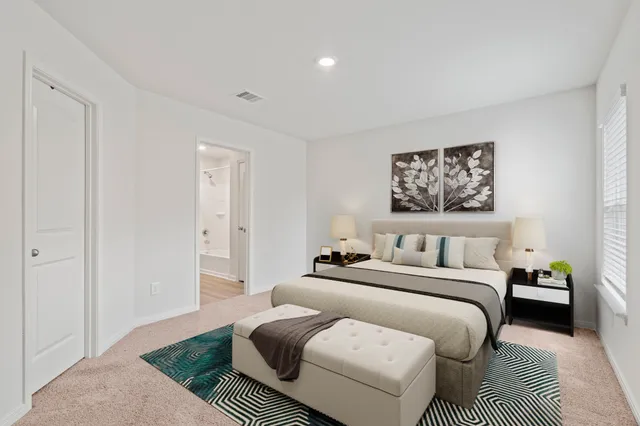 a bathroom with a double vanity sink and mirror