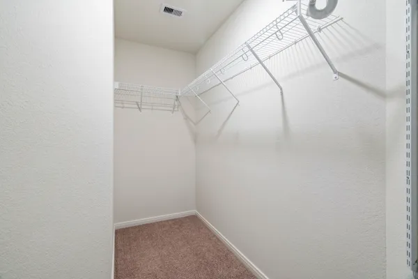 a view of small space with racks on the wall