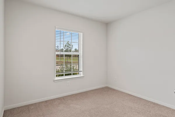 an empty room with a window