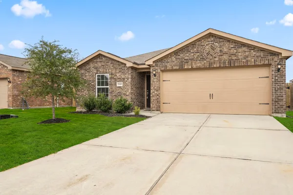 a front view of house with yard